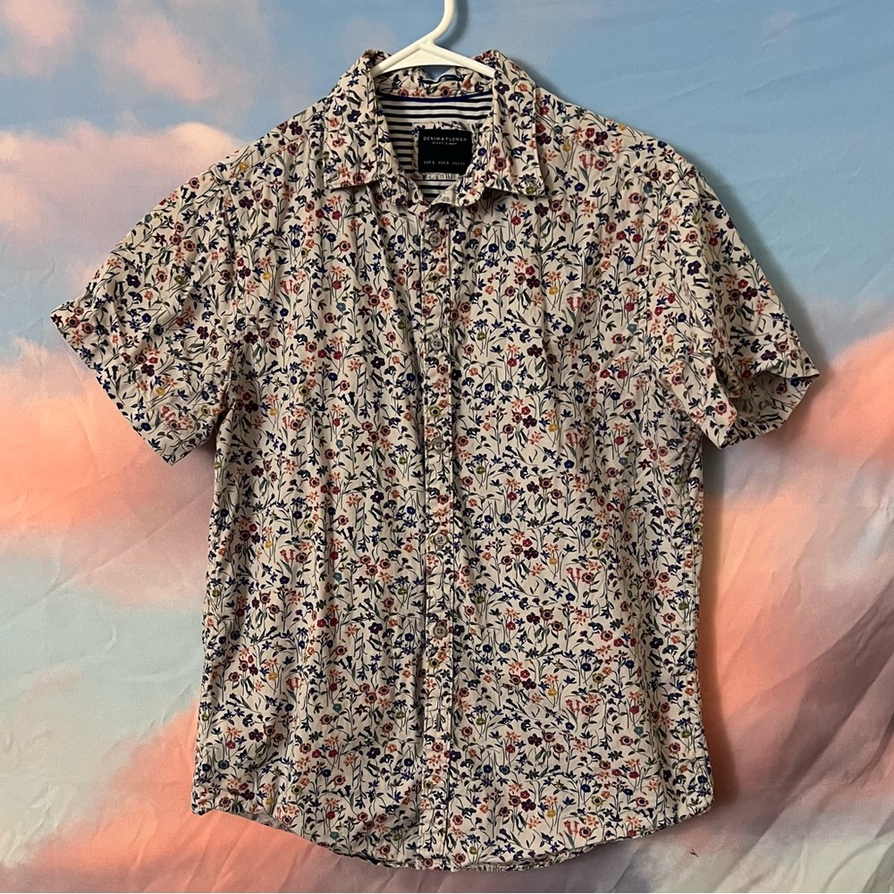 Floral short sleeved button up. White with multicolored flowers.